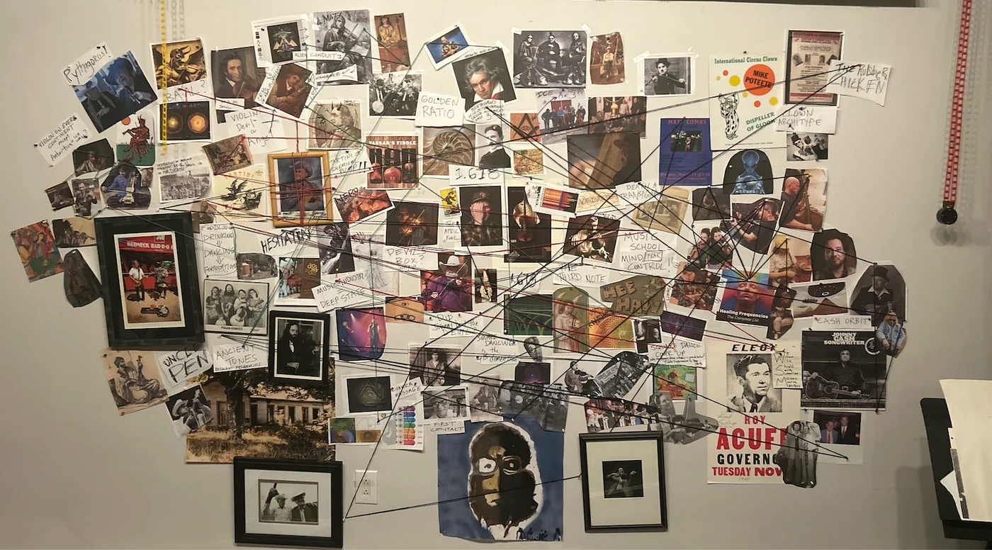 Matt's evidence wall — pinned photographs, scrawled notes, three threads