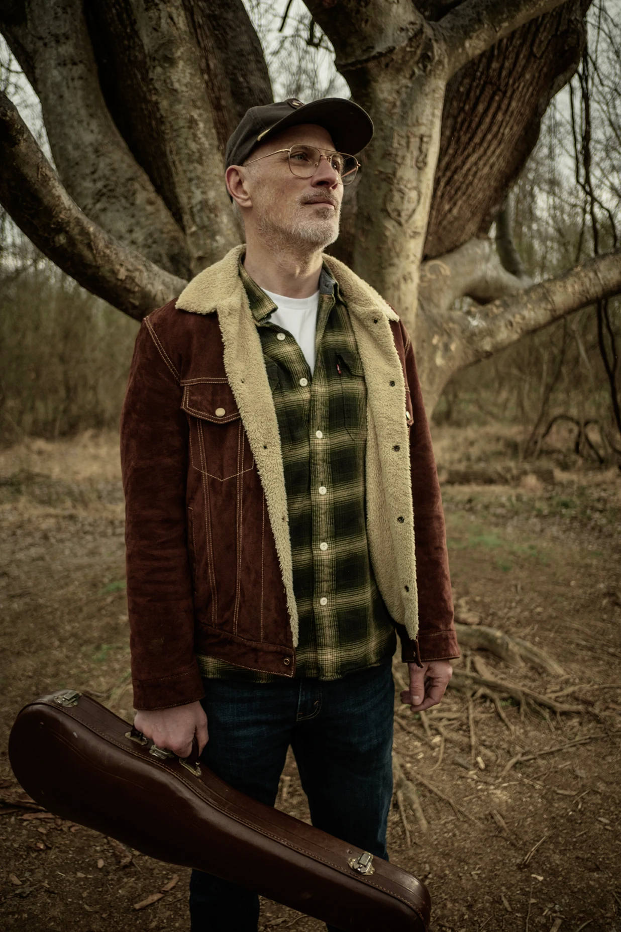 Matt Combs holding his fiddle