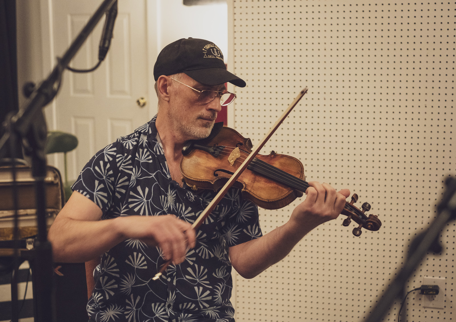 Matt Combs playing violin in the studio